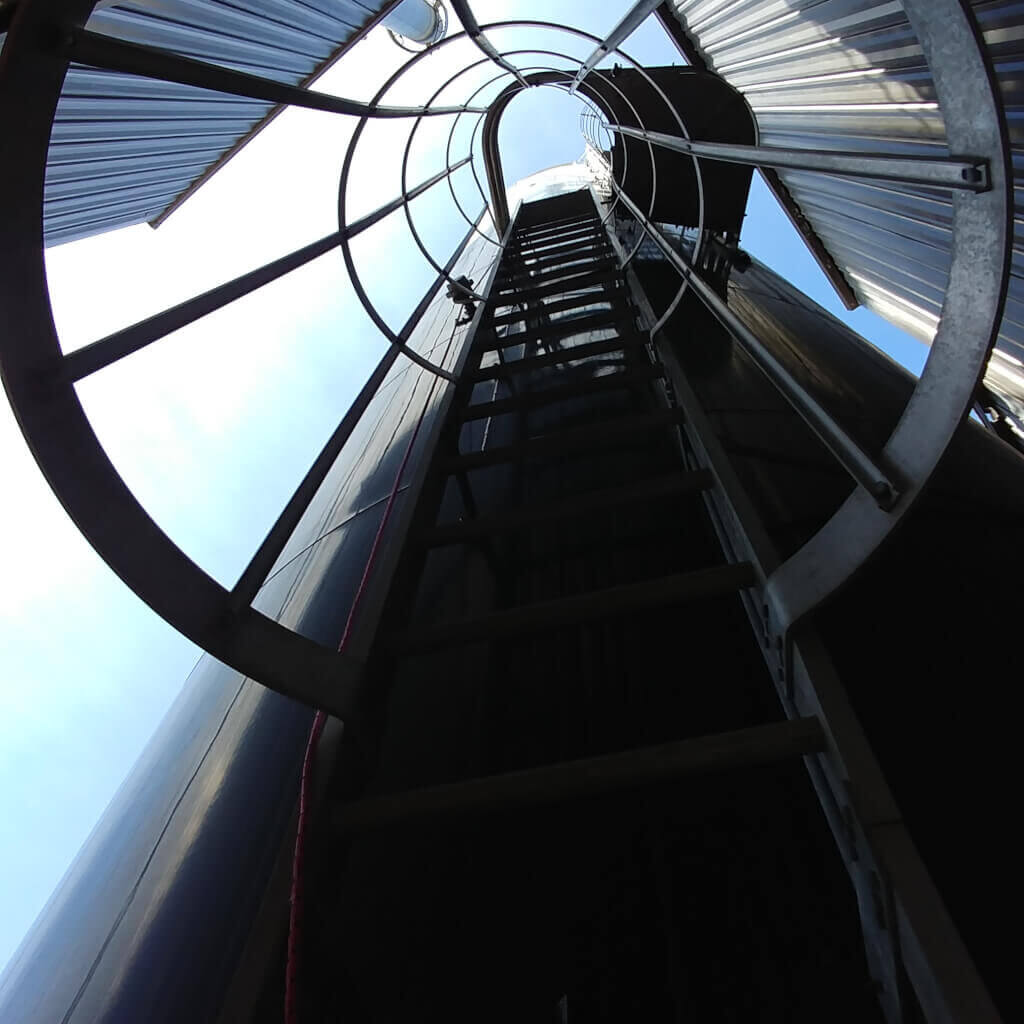 Ladder on industrial silo of Alexandria, Minnesota Waste Treatment Plant
